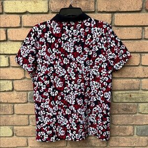Tommy Hilfiger Red, Black, White Floral Polo. Small light blue accents.